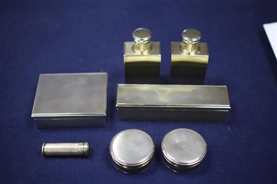 An early 20th century Cartier gilt metal mounted crocodile skin Doctors travelling toilet case